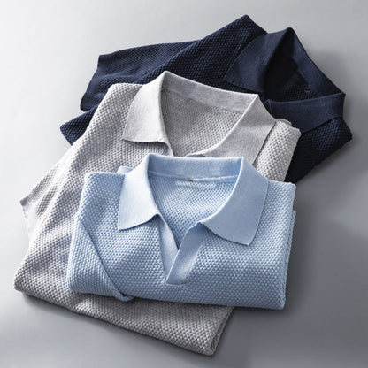 Men's effortless style knit polo, a versatile short sleeve shirt for smart casual occasions.