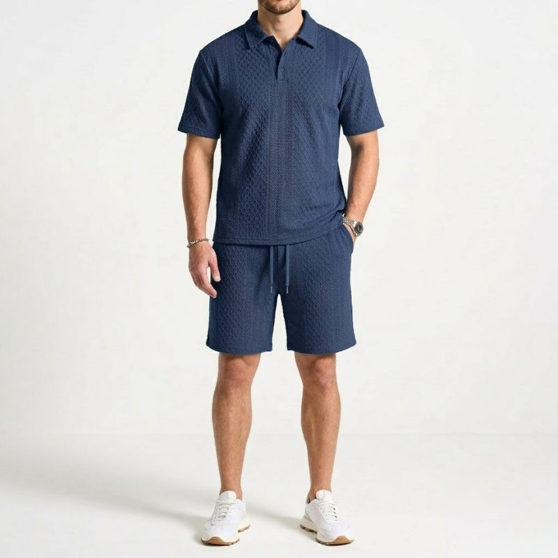 Stylish men's casual polo and shorts set for summer. Effortless two-piece outfit with comfortable textured fabric.