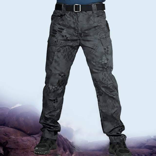 Texture shot of robust polyester cotton fabric in men's camouflage cargo pants