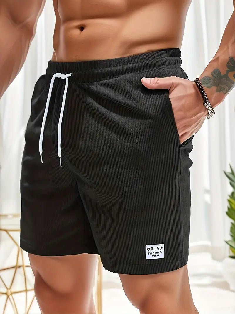 Durable men's quick-dry swimwear, elastic waist for comfort on vacation or at the pool.