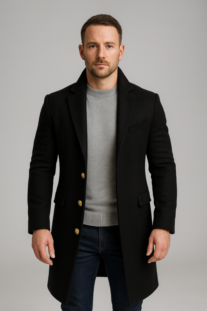 Men's elegant black long trench coat featuring striking gold buttons, perfect for sophisticated winter outerwear.