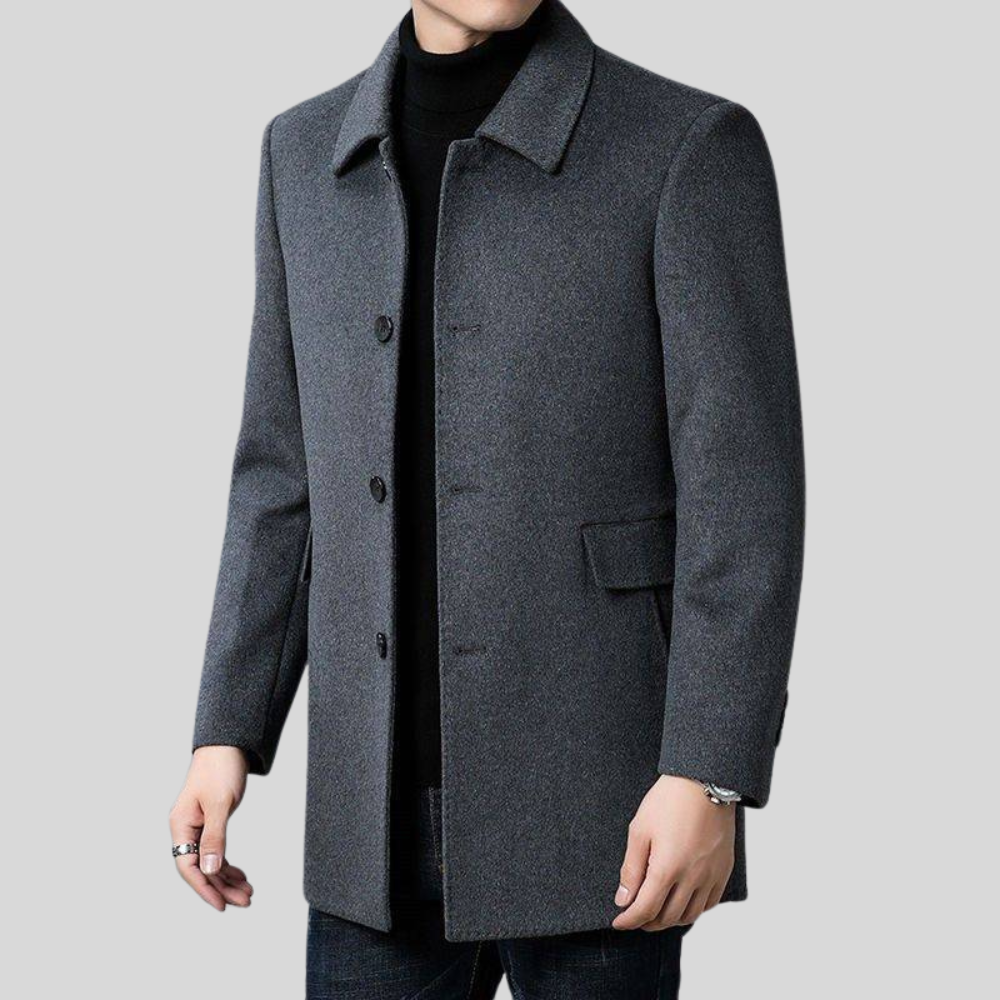 Men's tailored black overcoat for winter. Elegant and classic, suitable for business meetings or formal events.