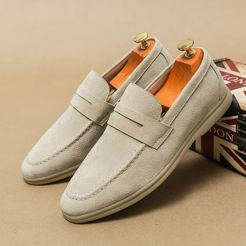 Stylish black men's slip-on loafers, elegant dress shoes for refined men's fashion.