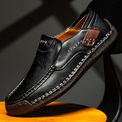 Stylish men's brown leather slip-on loafers. Elegant dress shoes perfect for a sophisticated casual look.