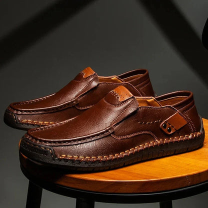 Classic men's slip-on loafers offering effortless style & comfort. Versatile dress & casual footwear for men.