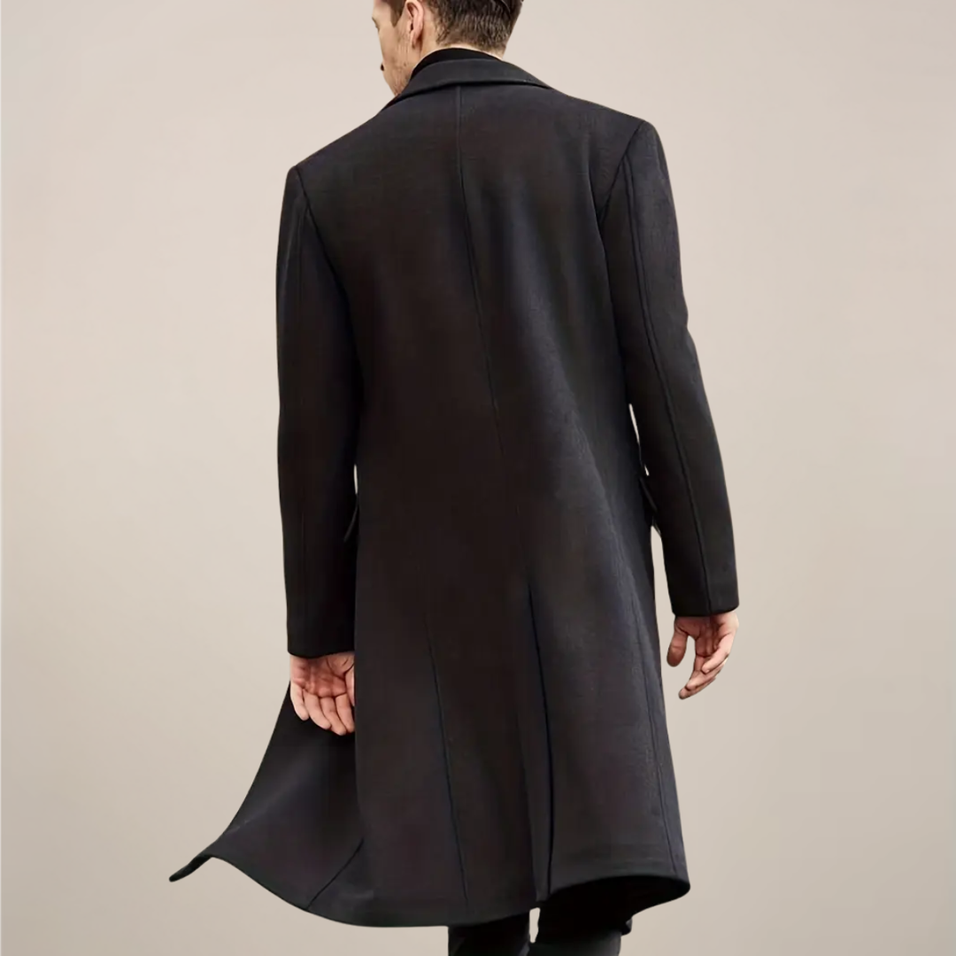 Stylish men's black long tailored winter overcoat. Warm, elegant single-breasted outerwear for formal business wear.
