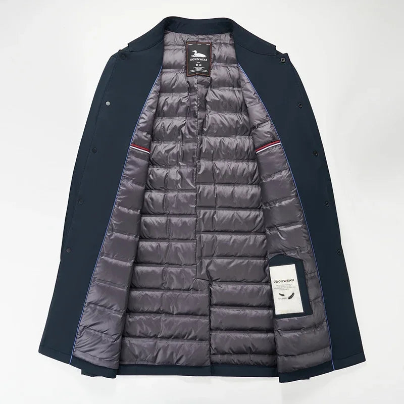 Stylish men's winter trench coat, suitable for business casual & urban fashion, providing warmth & a sleek look.