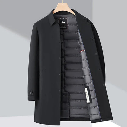Elegant men's long trench coat, insulated for winter warmth, featuring a sophisticated design for cold weather.