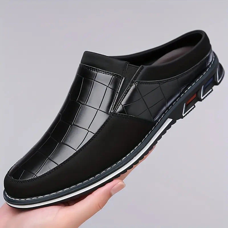 Men's elegant embossed slip-on mules; stylish, comfortable footwear for everyday.