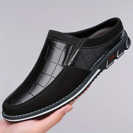 Men's elegant embossed slip-on mules; stylish, comfortable footwear for everyday.