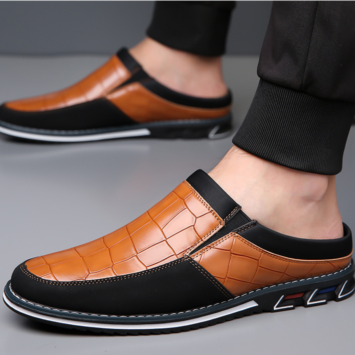 Everyday men's footwear: elegant embossed slip-on mules with a snug fit.