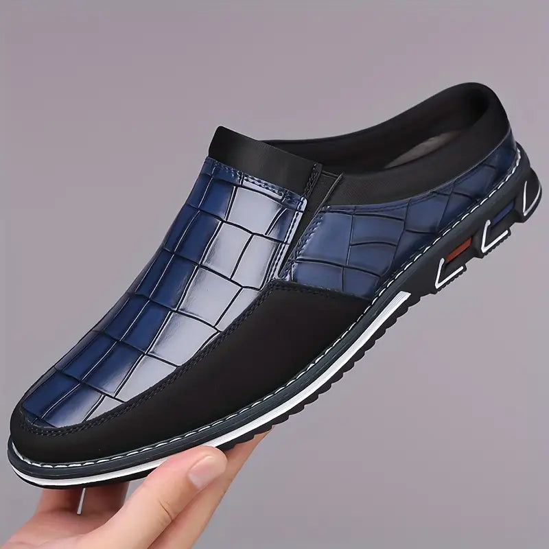 Trendy men's embossed slip-on mules, a must-have for modern fashion wardrobes.