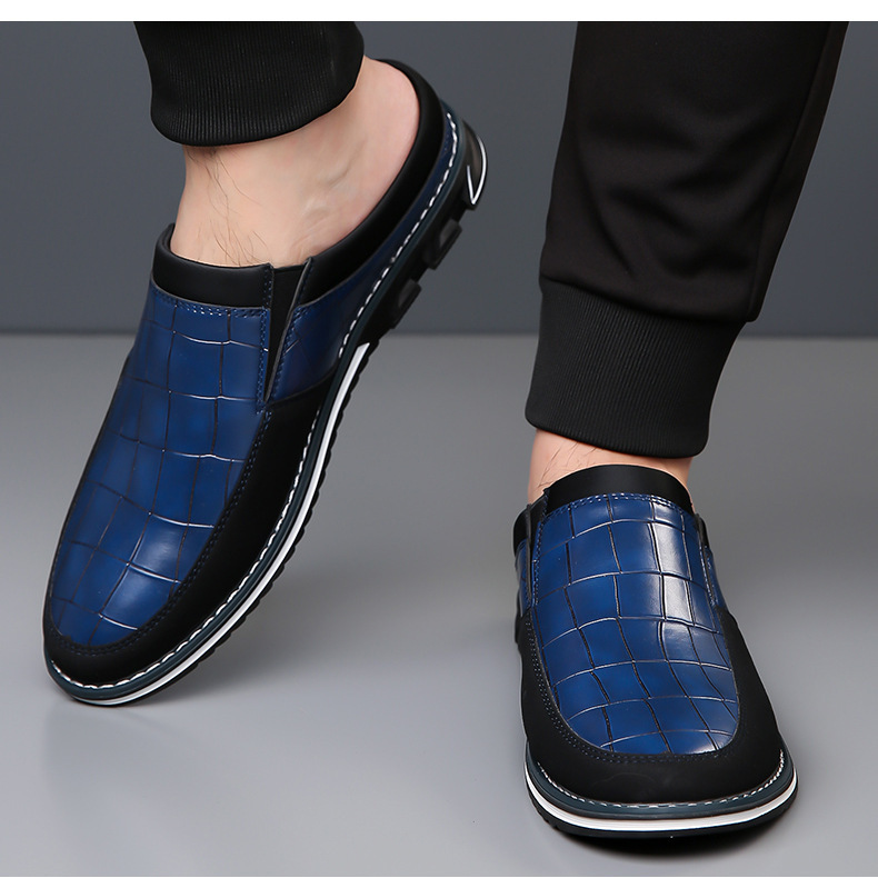 Sophisticated men's slip-on mules, featuring an intricate embossed design.