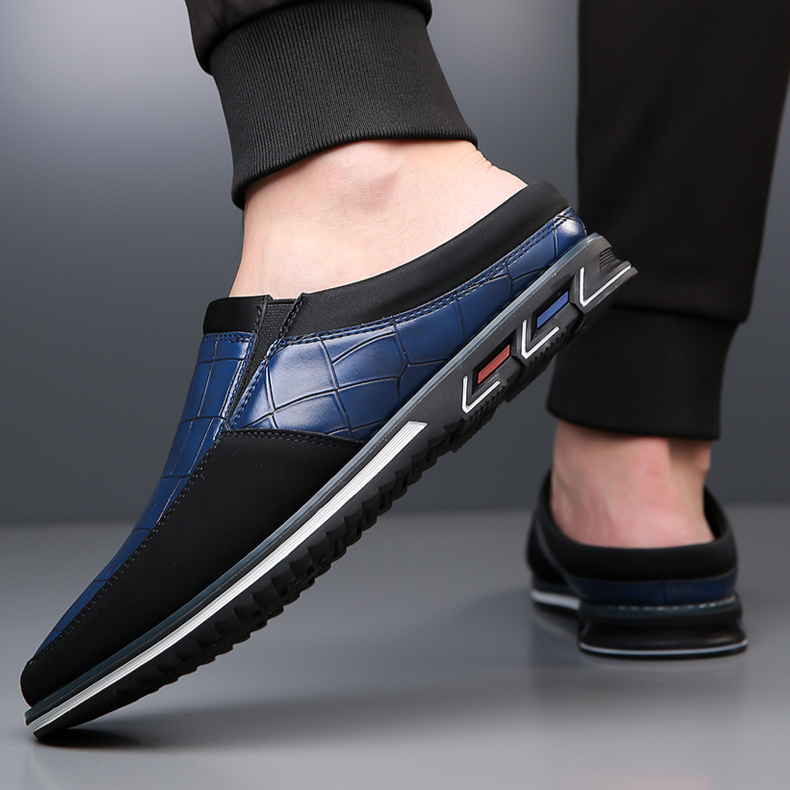 Men's embossed slip-on mules for effortless style; grip sole & cushioned comfort.