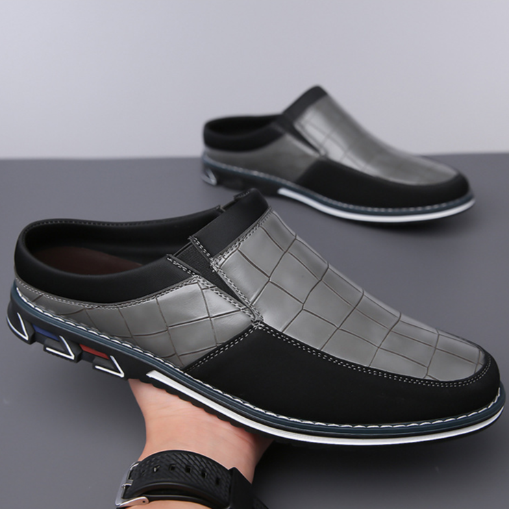 Men's contemporary slip-on mules, perfect for dress or casual occasions.