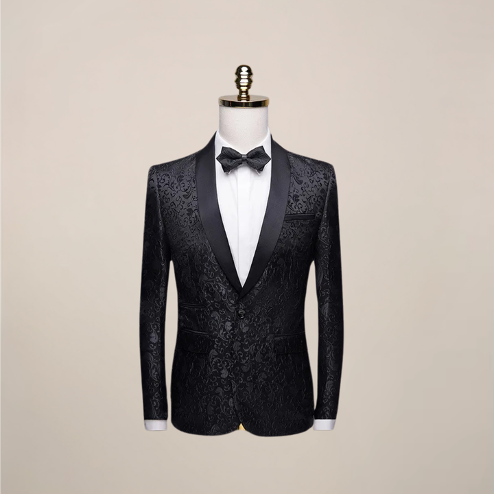 Men's embroidered tuxedo blazer paired with a crisp shirt & bow tie. A sharp, complete look for formal events.