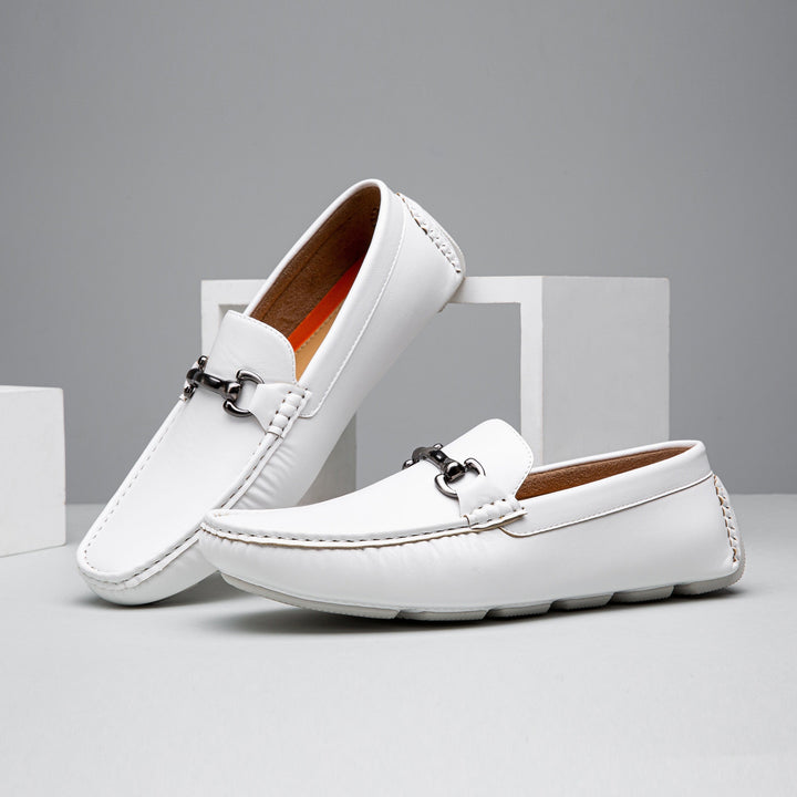 Black leather formal loafers for men, featuring a sleek design and comfortable slip-on style. Ideal dress shoes.