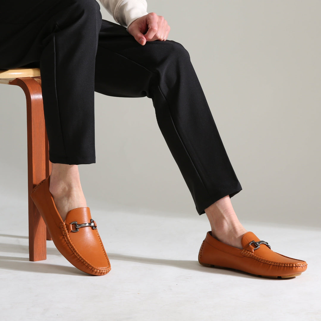 Sleek black men's dress loafers with a refined finish, providing superior comfort and elegant style for formal wear.