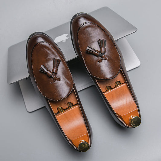 Men's elegant polished tassel loafers, perfect for formal or smart casual outfits, offering classic comfort.