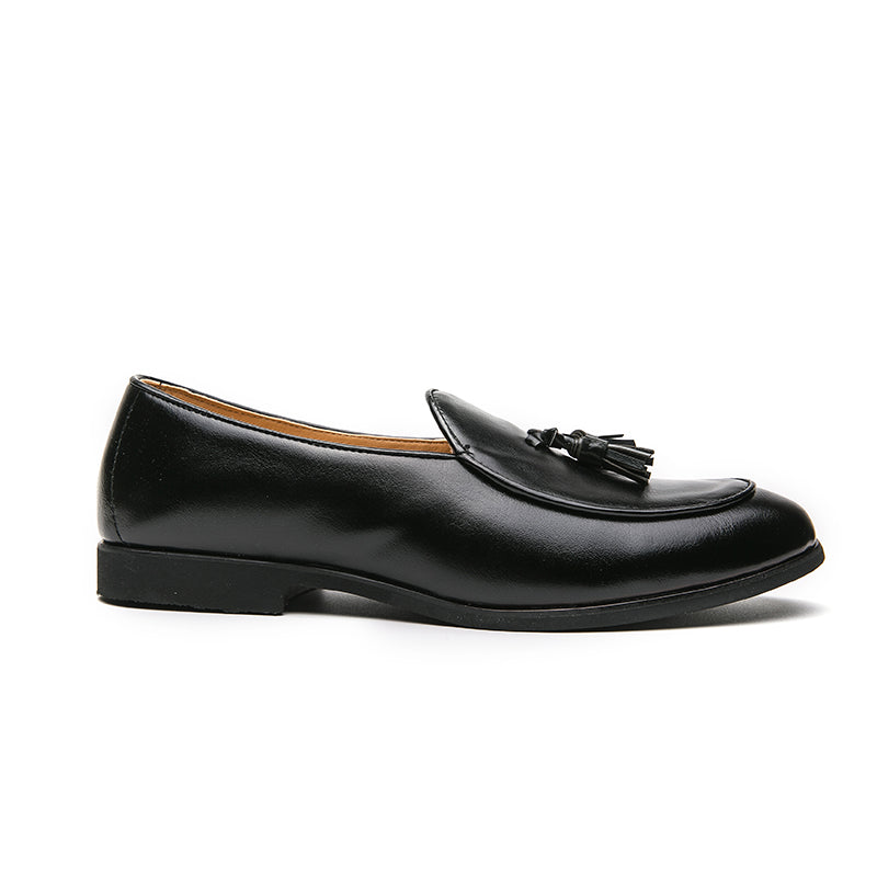 Glossy polished men's tassel loafers, elegant slip-on shoes providing comfort for classic formal & casual looks.
