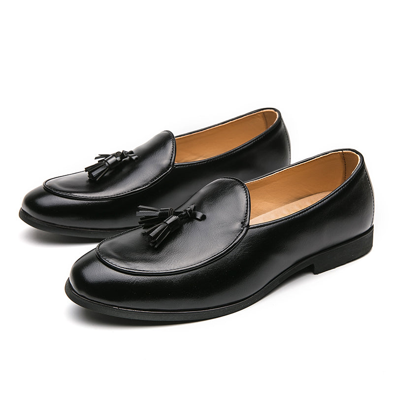 Front view of men's elegant polished tassel loafers, slip-on comfort for formal and casual classic men's fashion.
