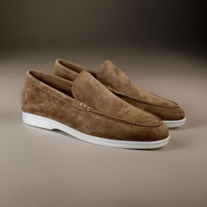Comfortable men's slip-on loafers for spring/summer. Elegant classic footwear, versatile for dress or casual.