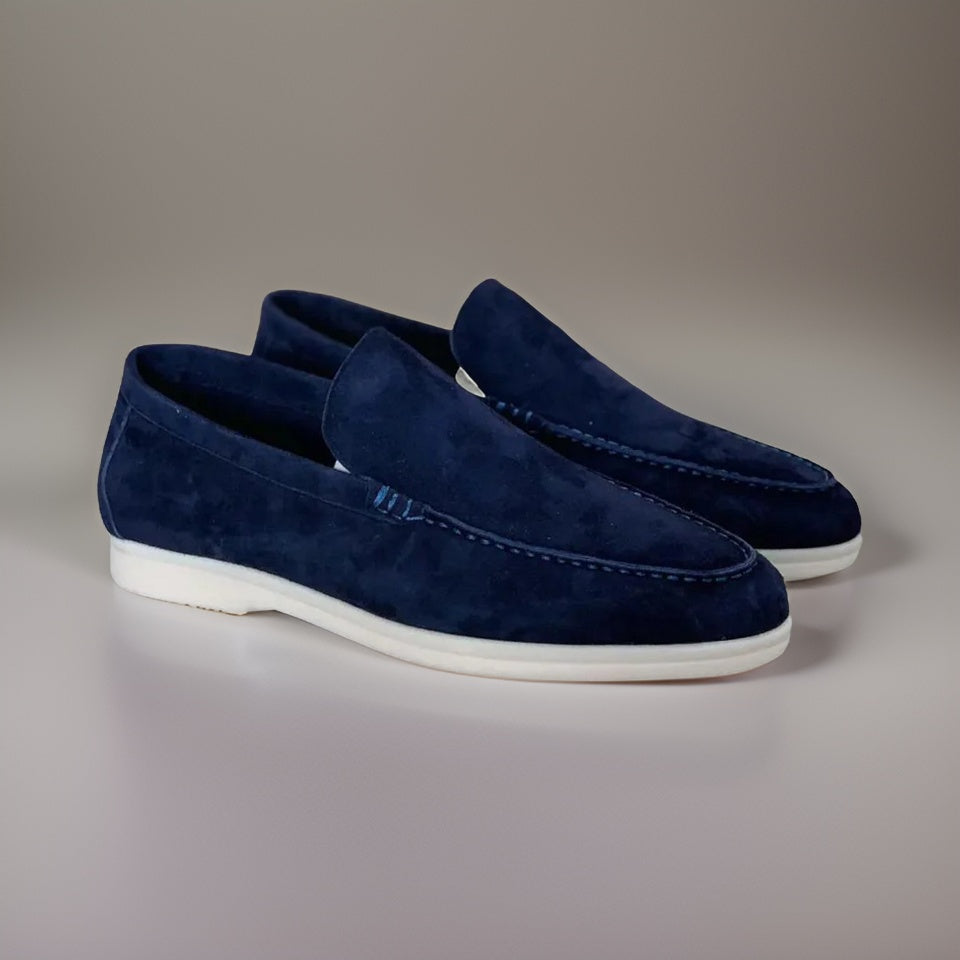 Sophisticated men's slip-on dress loafers. Elegant footwear for formal or smart casual menswear fashion.