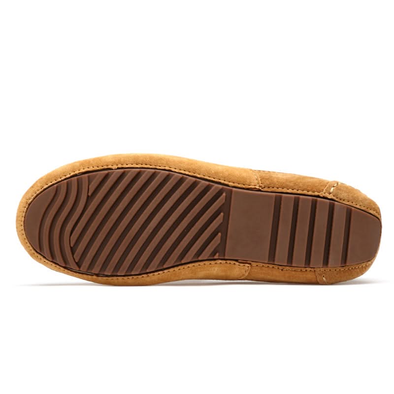 Top view of classic men's slip-on loafers, highlighting sleek design and comfortable everyday wearability.