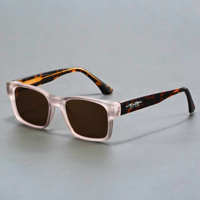 Stylish man wearing elegant UV400 protection sunglasses with anti-glare gradient lenses. Men's durable eyewear.