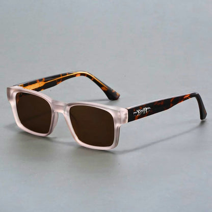 Stylish man wearing elegant UV400 protection sunglasses with anti-glare gradient lenses. Men's durable eyewear.