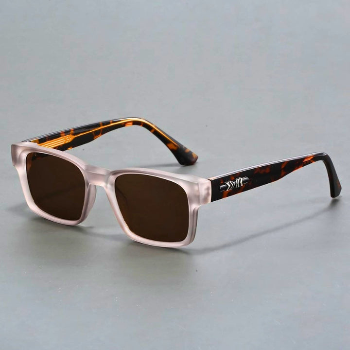 Stylish man wearing elegant UV400 protection sunglasses with anti-glare gradient lenses. Men's durable eyewear.