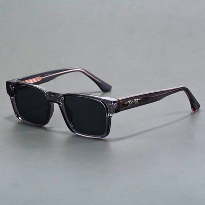 Close-up of men's elegant UV400 sunglasses, showing gradient lenses & durable frame. Anti-glare eye protection.