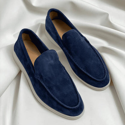 Sophisticated men's Turin style leather loafers with subtle stitching, excellent for dress & casual.