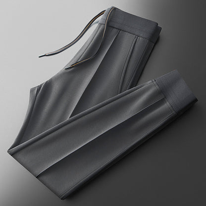 All-season men's athletic tracksuit set, ultimate comfort & stylish casual wear for active men.
