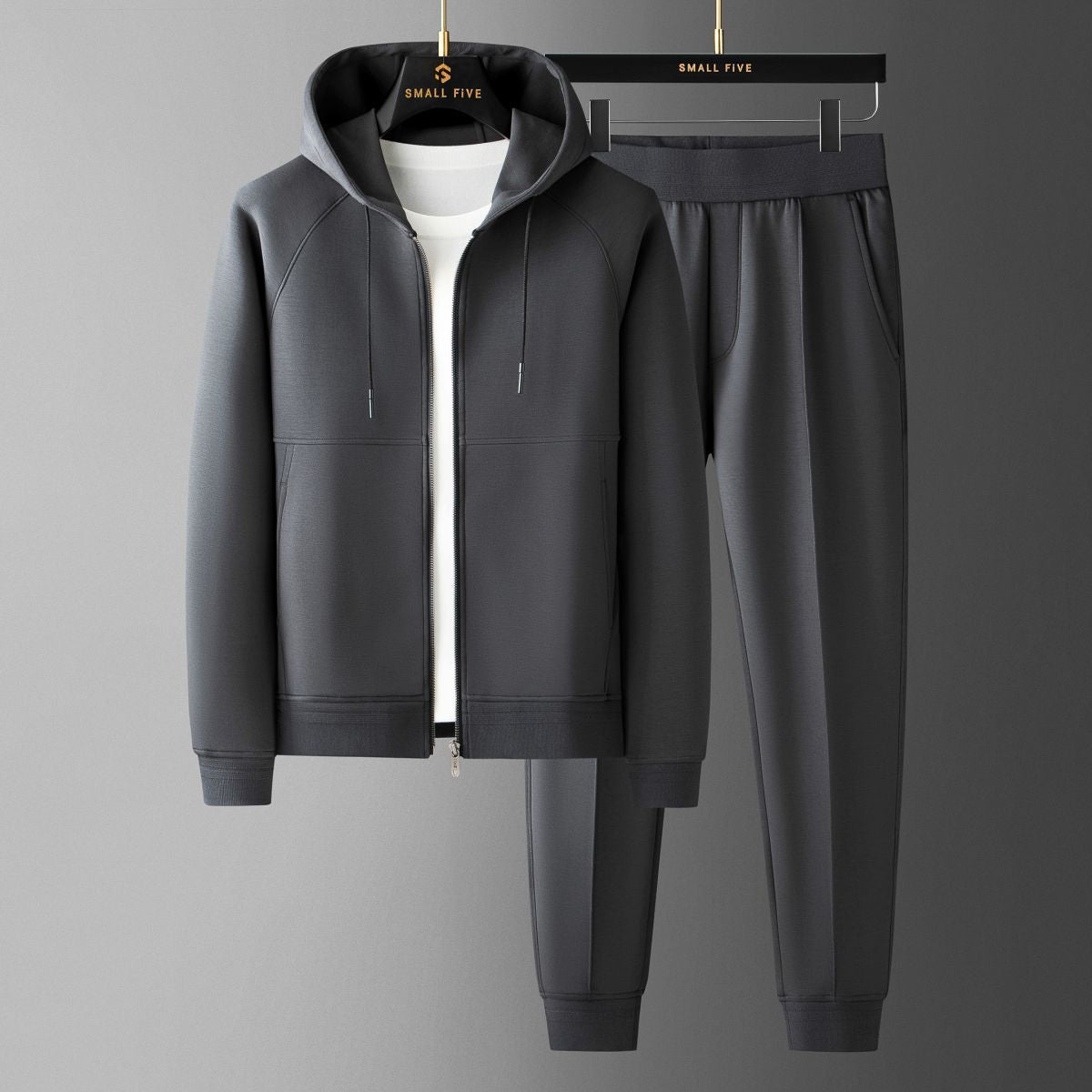Man in full men's elite tracksuit set, showcasing ultimate comfort, athletic style & premium loungewear.