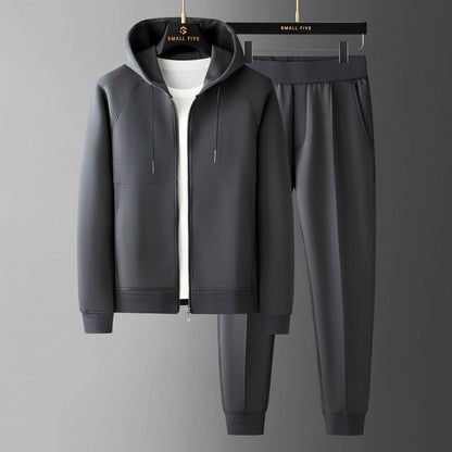 Man in full men's elite tracksuit set, showcasing ultimate comfort, athletic style & premium loungewear.