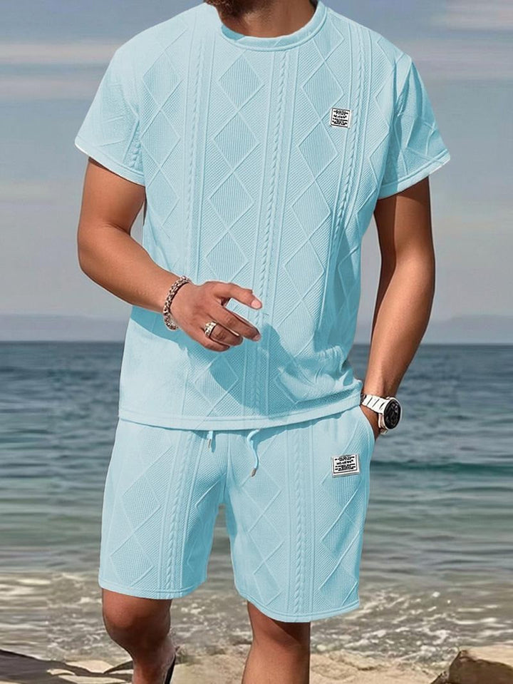 Stylish men's embossed leather look matching set. Fashionable two-piece for smart casual or everyday wear.