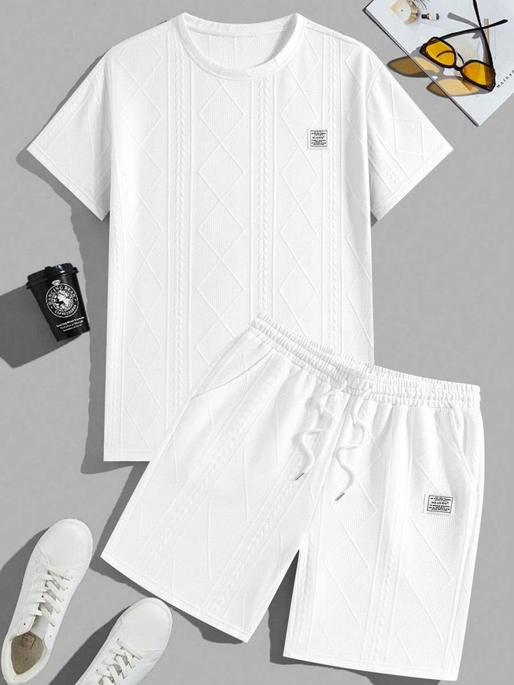 Comfortable men's lounge matching set with embossed leather style. Ideal two-piece outfit for relaxed fashion.