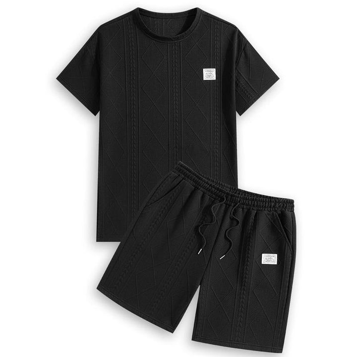 Men's two-piece embossed leather style set. A coordinated casual outfit for modern men's clothing fashion.