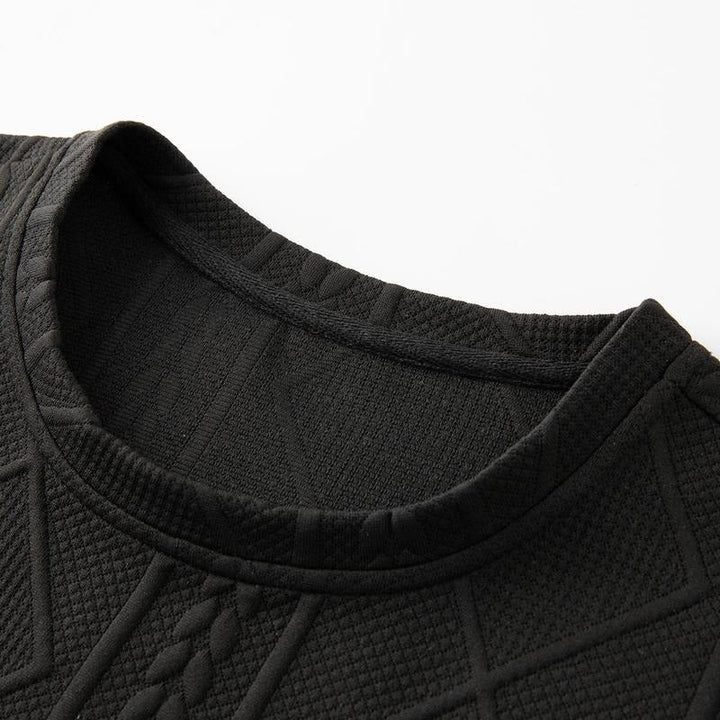 Fashionable men's embossed leather style two-piece set. Combining comfort and trend for men's coordinated outfits.