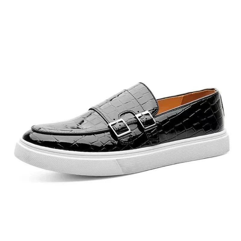 Trendy men's platform slip-on loafers. Features embossed pattern, stylish buckle, and easy comfortable wear.