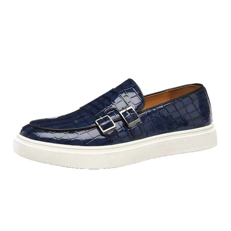 Men's fashionable slip-on loafers. Platform sole, intricate embossed design, and a sophisticated buckle.