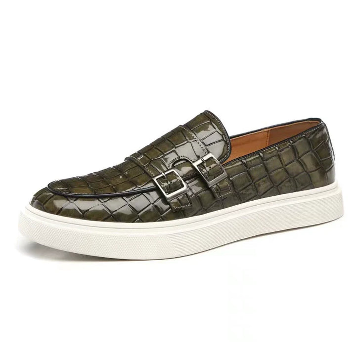 Detailed men's embossed platform loafers with buckle. Slip-on design offers versatile style & comfort.