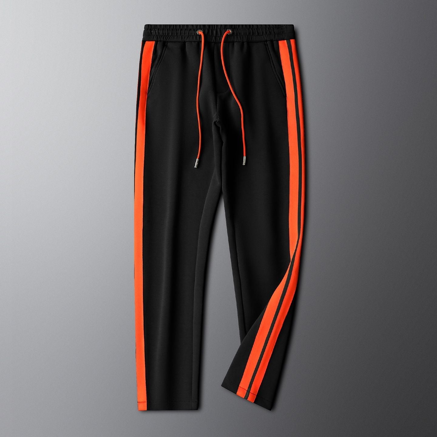 Contemporary men's embroidered tracksuit, combining comfort with modern sport and street fashion style.