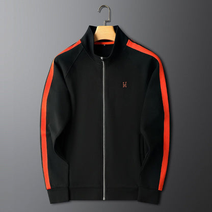 Men's two-piece embroidered tracksuit. Features detailed stitching, great for activewear & casual wear.