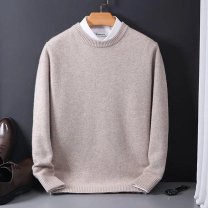 Model wearing a stylish men's Emory long sleeve sweater, offering elegant comfort for winter fashion looks.