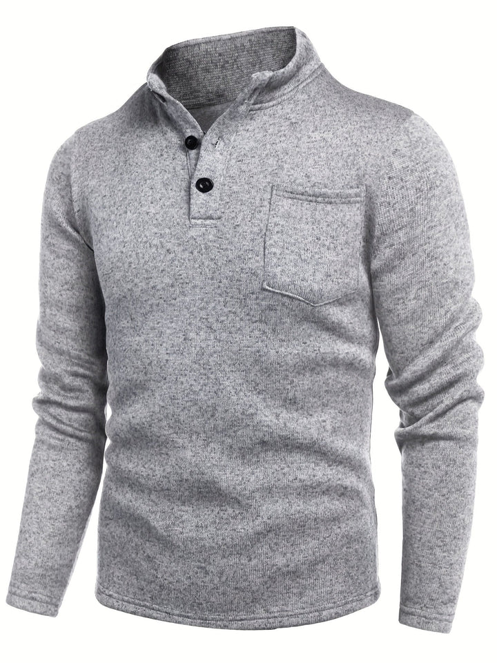 Man wearing a light grey essential long sleeve shirt, perfect for casual everyday outfits, stand collar detail.