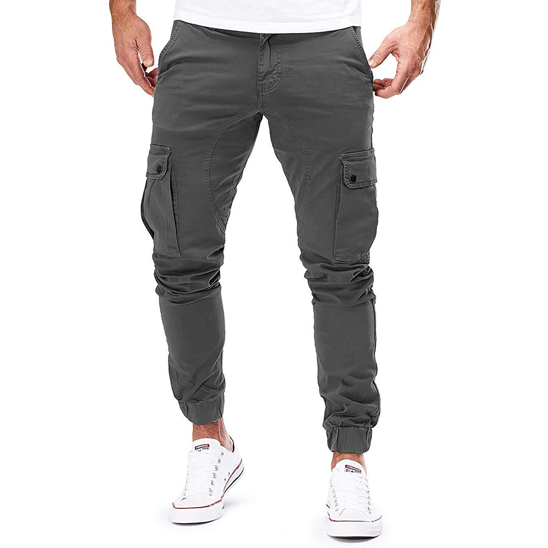 Model wearing Men's Everyday Comfort Cargo Joggers. Athletic fit, comfortable stretch, ideal for men's casual wear.