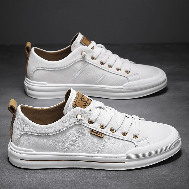 Comfortable men's grey low-top sneakers for everyday wear, ideal for walking.