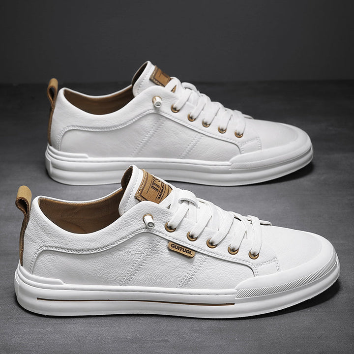 Comfortable men's grey low-top sneakers for everyday wear, ideal for walking.